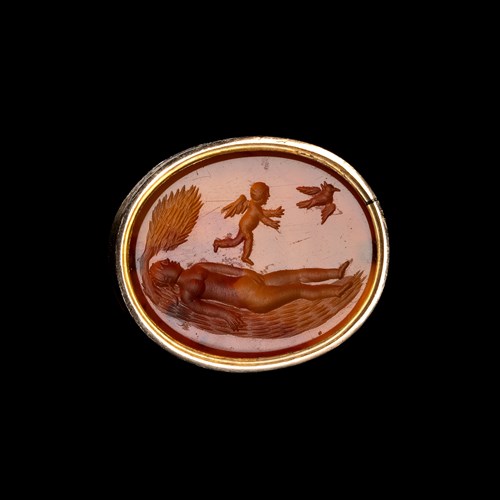 A English Georgian Era gold seal with an engraved carnelian. Allegorical scene of the soul.